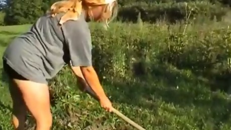 Busty blond farm babe works in the field and tires